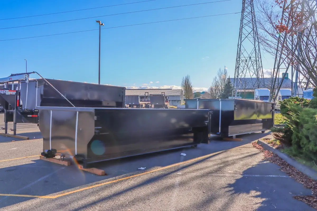 Roll-off dumpster ready for waste disposal at job site for 4 Yard Dumpster Rental in Spring Hill
